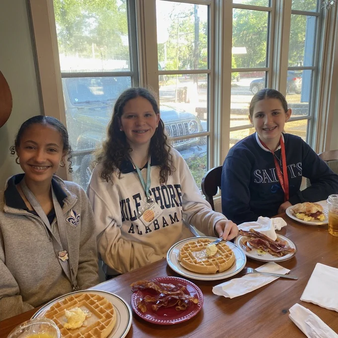 Students enjoy breakfast at the Birdman Cafe 