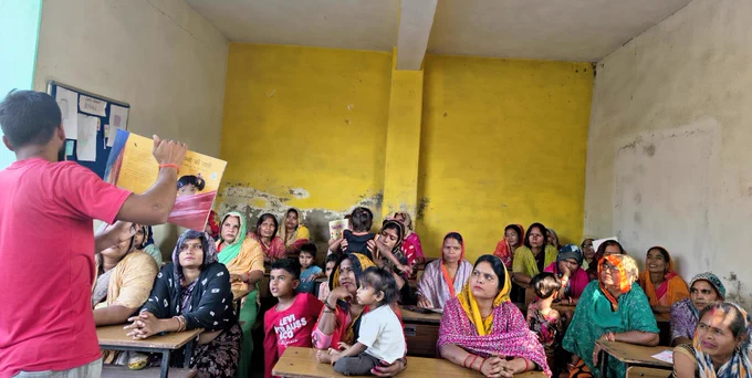 Women and children gather at Bansa Community Library during a Mother’s Day celebration, sitting together for story readings, conversations, and community activities inside and outside the library. The images show women listening to read-aloud sessions, sharing time with one another, celebrating with cake, and smiling together in the library courtyard, reflecting the library as a warm community space for connection, reading, and belonging.

