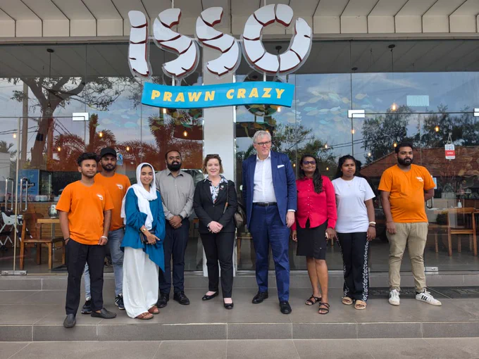 High Commissioner, Isabelle Martin and UK High Commissioner, Andrew Patrick with team members of BlackPool Ventures at the seafood restaurant ISSO. ISSO operates an outlet within the premises of the Blackpool Complex in Trincomalee.
