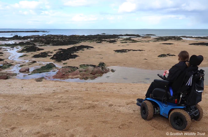 Beach wheelchair on beach in Moray