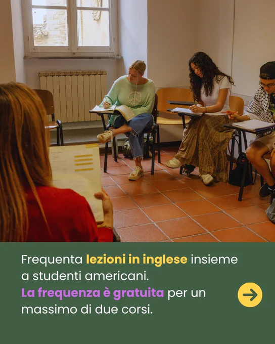Students participate in an English class with American peers. The session is informal and inviting, emphasizing cultural exchange.