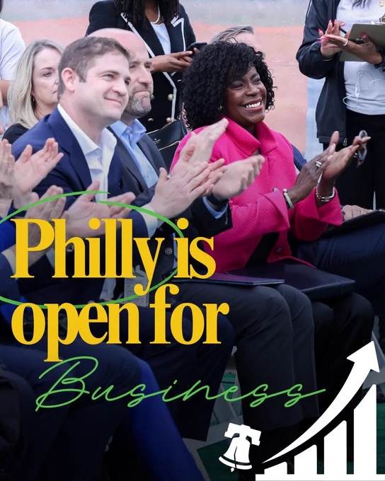 Mayor Cherelle L. Parker sitting and clapping.
