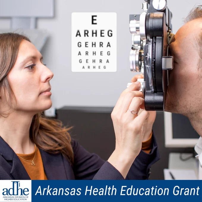 Photo of an optometrist checking the vision of a patient in her exam room. The text below reads, "Arkansas Health Education Grant," and the graphic includes the Arkansas Division of Higher Education logo.