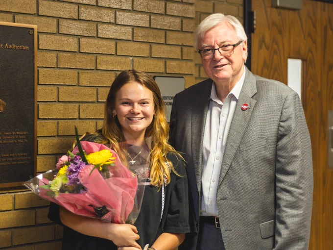 Kayla Thompson pictured with USC President Michael Amiridis