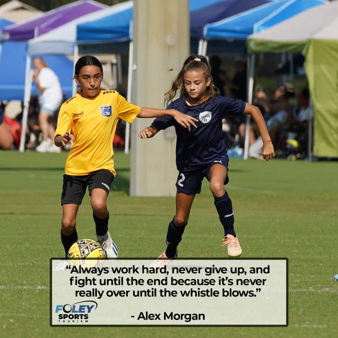Two youth soccer players fighting for a soccer ball with a quote from Alex Morgan over the top that says "Always work hard, never give up, and fight until the end because it's never really over until the whistle blows."