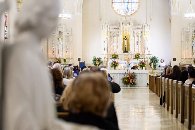 Fr. Greg Fluet leading Mass in the Chapel of the Most Holy Rosary.