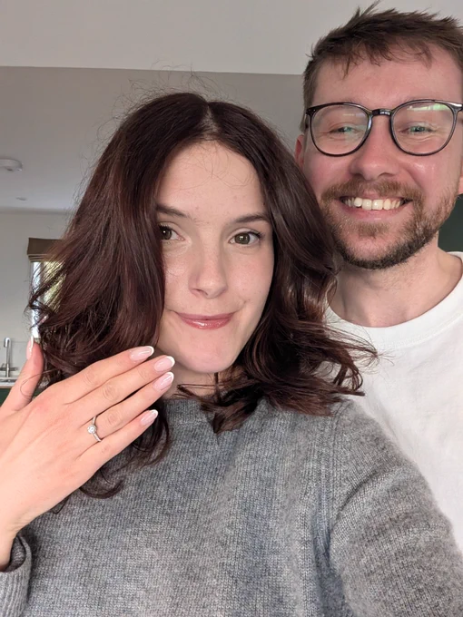 A nicer photo of us both in a kitchen