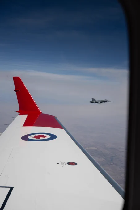 A NORAD CF-18 Hornet intercepts a track of interest (CC-144 Challenger) during AMALGAM MUTE, a no-notice, live-fly exercise to test response capabilities of NORAD units.