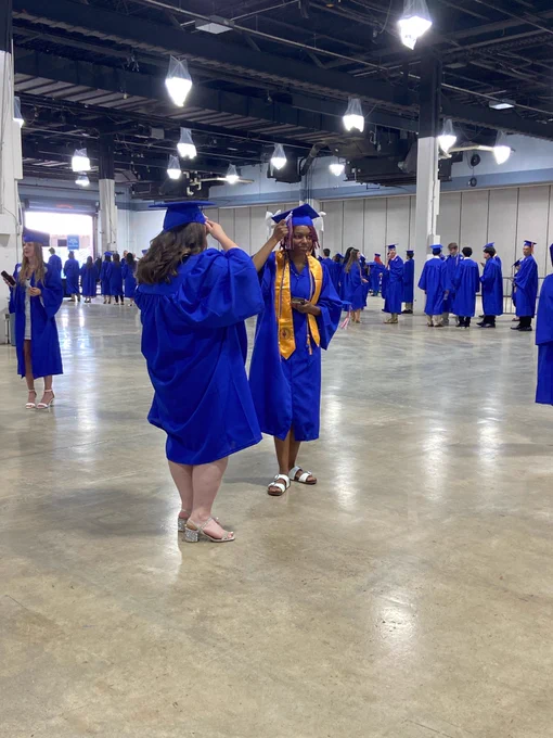 Photos of students lining up before RCC’s 2026 Commencement Ceremony. 