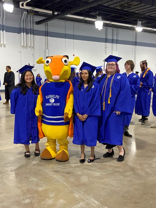 Photos of students lining up before RCC’s 2026 Commencement Ceremony. 