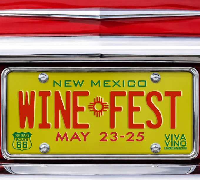 Bright yellow New Mexico license plate promoting Wine Fest from May 23-25 with Route 66 and Viva Vino logos.
