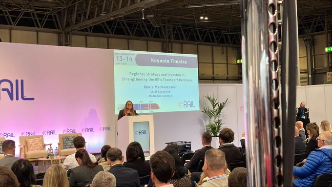 Photo of Maria delivering her keynote speech at UK Rail 2026