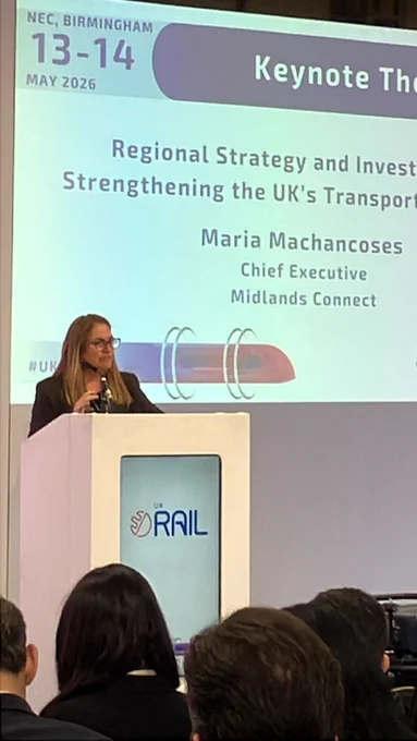 Photo of Maria delivering her keynote speech at UK Rail 2026