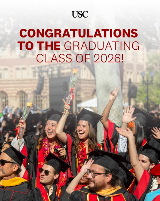 USC congratulates the Class of 2026 with graduates in caps and gowns celebrating outdoors holding flowers.