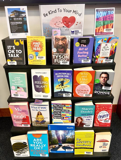 A "Be kind to your mind" book display with a selection of books on Mental Health and Wellbeing.