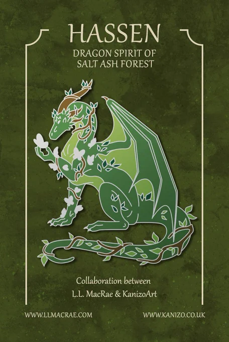 The design of a pocket dragon pin on a dark green backing board. The text appears: 

Hassen - Dragon Spirit of Salt Ash Forest

Collaboration between L.L. MacRae and KanizoArt

www.llmacrae.com 
www.kanizo.co.uk

The dragon spirit is green, representing a forest. He sits up proudly, and silver butterflies appear from the plating. He holds one silver butterfly close to his face
