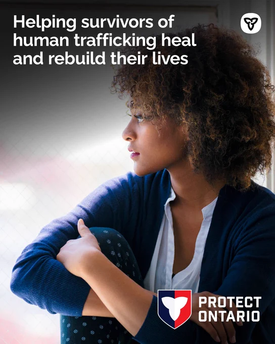 Woman gazing out a window, message: helping human trafficking survivors heal and rebuild lives. 