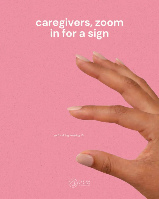 A hand forming a pinching gesture appears against a pink background. Text above reads, "caregivers, zoom in for a sign," while smaller text below says, "you're doing amazing <3." The logo at the bottom reads "Caring Across.