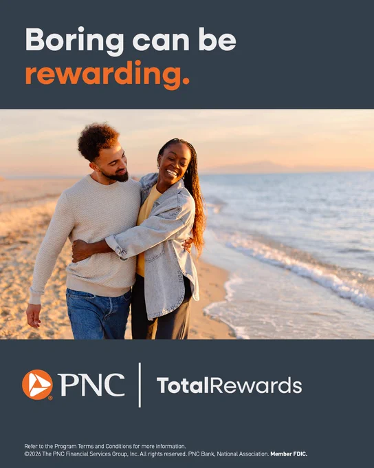 Couple walking on beach. Boring can be rewarding. PNC TotalRewards. 