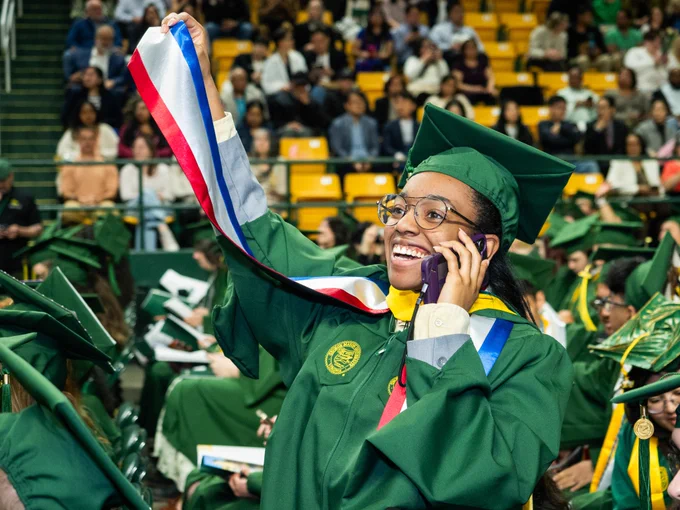Graduates celebrate before the 2026 Spring Commencement at EagleBank Arena.     Photo by Andani Munkaila/Creative Services/George Mason University