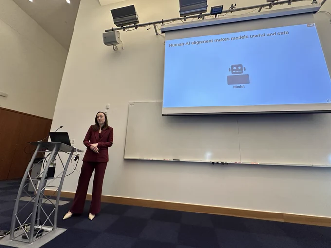 Angie delivering her thesis defense