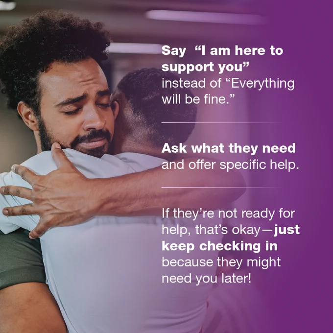 Two individuals embracing in a supportive hug with text overlay offering advice on how to help someone in distress, emphasizing verbal support and the importance of being there for them.