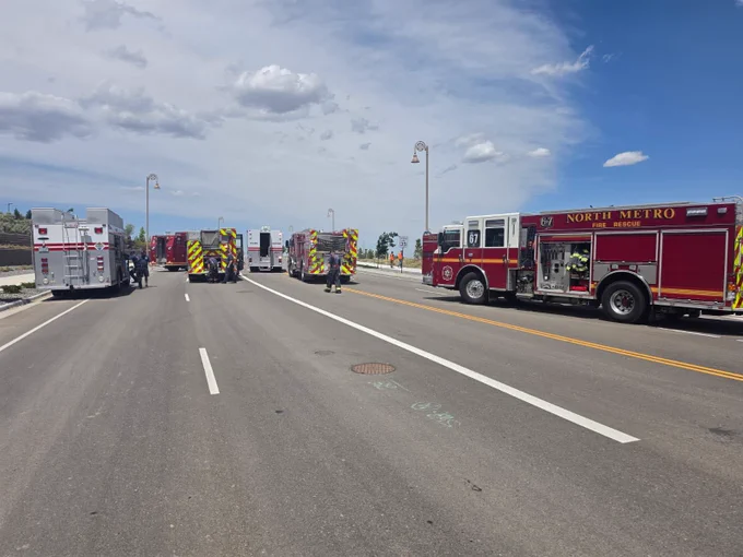 Several fire apparatus staged on the street