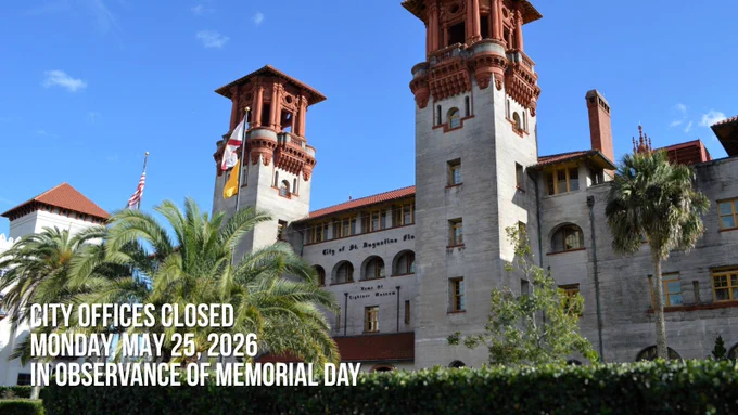 A historic building with two towers, known for its Spanish Revival architecture. The front of the building is surrounded by palm trees. Text on the image reads, "City Offices Closed Monday May 25, 2026 In Observance of Memorial Day.