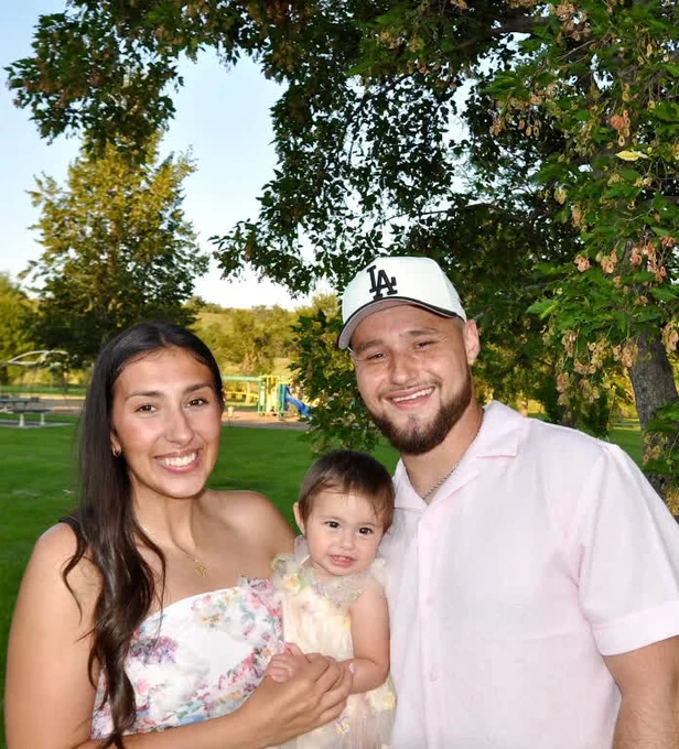 Justin with family outdoors
