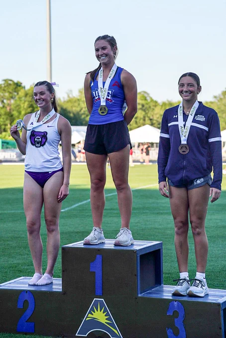 three asun pole vaulters on a podium after a competition