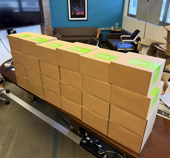 Stack of boxed NVIDIA DGX Spark-based Stelline Developer Kits ready to ship to scientists.
