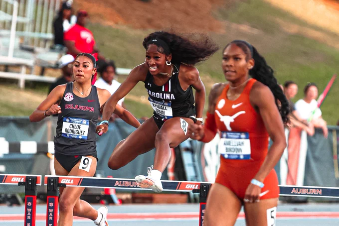 Kyndall Harrington-Spain clearing the hurdle in the women’s 400-meter hurdle preliminary round at the SEC Outdoor Championship.