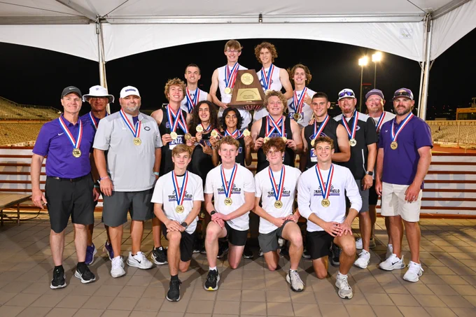Canyon team and coaches pose with championship trophy.