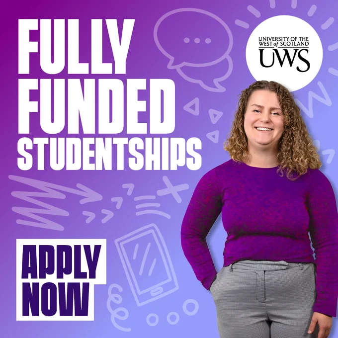 Purple advertisement for fully funded studentships at the University of the West of Scotland (UWS) featuring a smiling individual. Text reads "Fully Funded Studentships. Apply Now" with icons of a speech bubble and a smartphone.