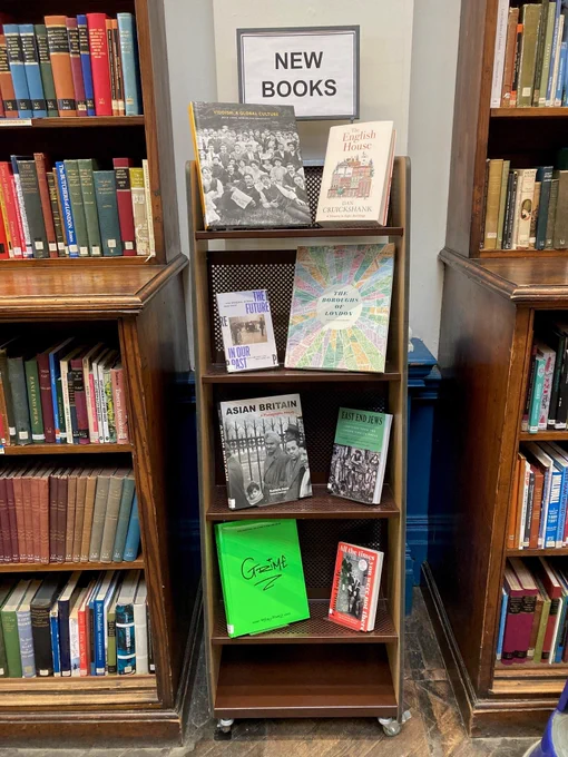 A new books display showing eight titles on various East End-related topics.