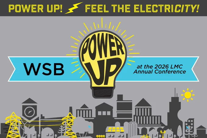 Yellow light bulb with 'POWER UP' text glowing above a cityscape, promoting the 2026 LMC Annual Conference by WSB.
