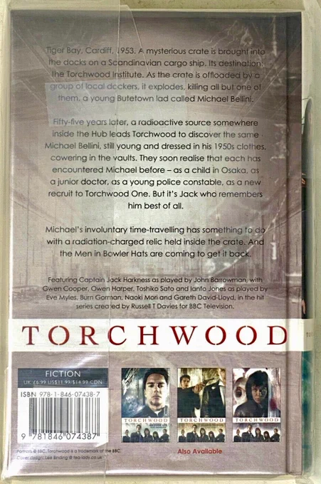 Tiger Bay, Cardiff, 1953. A mysterious crate is brought into the docks on a Scandinavian cargo ship. Its destination: the Torchwood Institute. As the crate is offloaded by a group of local dockers, it explodes, killing all but one of them, a young Butetown lad called Michael Bellini.

Fifty-five years later, a radioactive source somewhere inside the Hub leads Torchwood to discover the same Michael Bellini, still young and dressed in his 1950s clothes, cowering in the vaults. They soon realise that each has encountered Michael before - as a child in Osaka, as a junior doctor, as a young police constable, as a new recruit to Torchwood One. But it's Jack who remembers him best of all.

Michael's involuntary time-travelling has something to do with a radiation-charged relic held inside the crate. And the Men in Bowler Hats are coming to get it back.  

TORCHWOOD