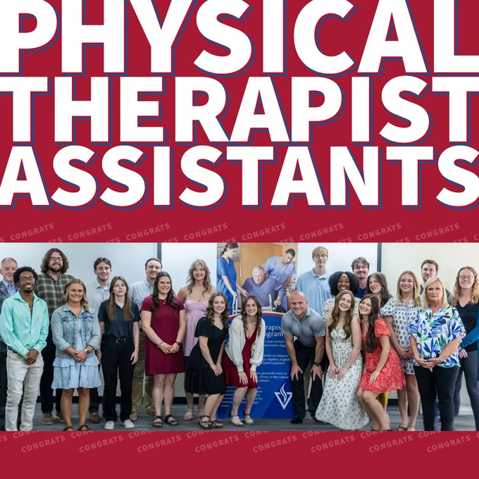 ‘Physical Therapist Assistants’
The cohort of recent graduates are posing in two rows of students and faculty.