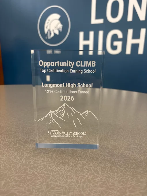 A clear acrylic award plaque engraved with "Opportunity CLIMB Top Certification-Earning School — Longmont High School 