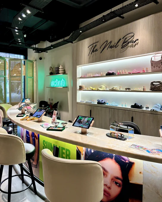 An image of a nail bar  with schuh branding.