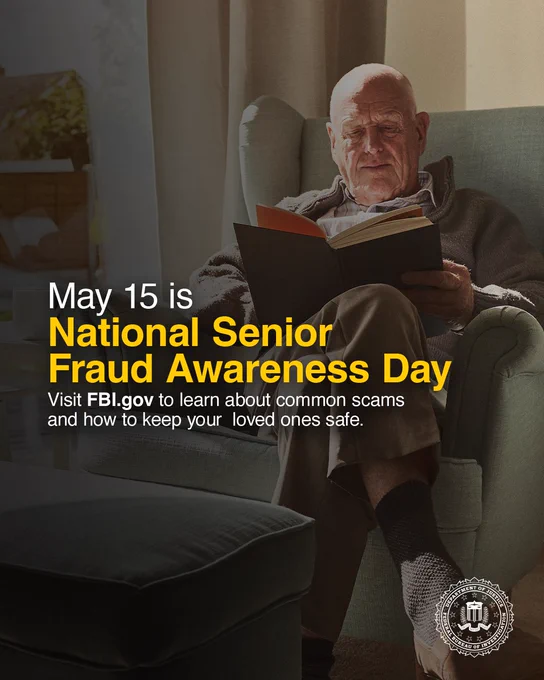 Elderly man sitting in armchair reading a book, promoting National Senior Fraud Awareness Day on May 15 with FBI.gov info on scam prevention.