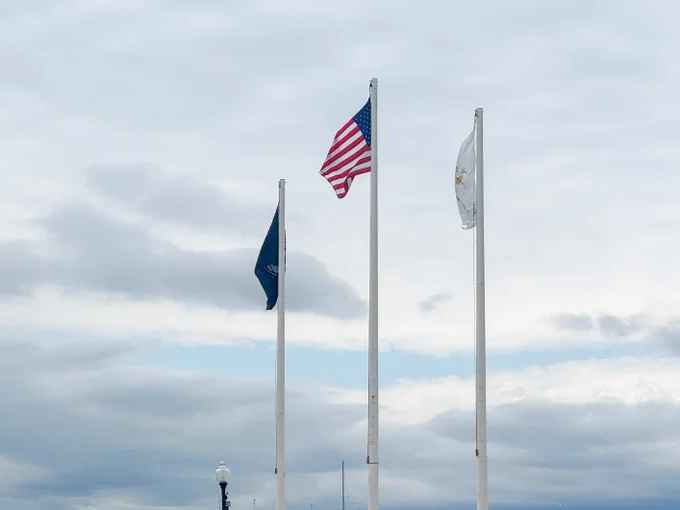 photo of American flag and Rhode Island flag