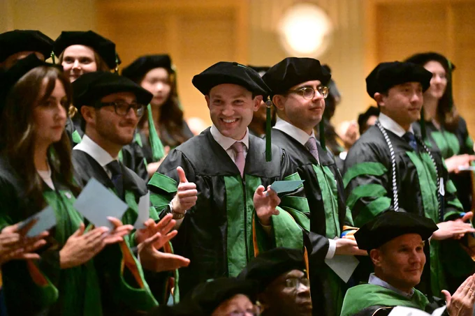 A new graduate from Kent State's College of Podiatric Medicine participates in graduation, Spring, 2026