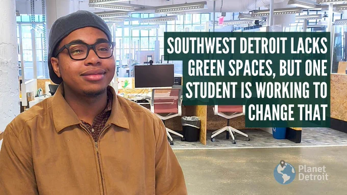 A young person (Zayd Walid) in a brown jacket and hat stands smiling in a modern office. Text on the image reads, "Southwest Detroit lacks green spaces, but one student is working to change that."
