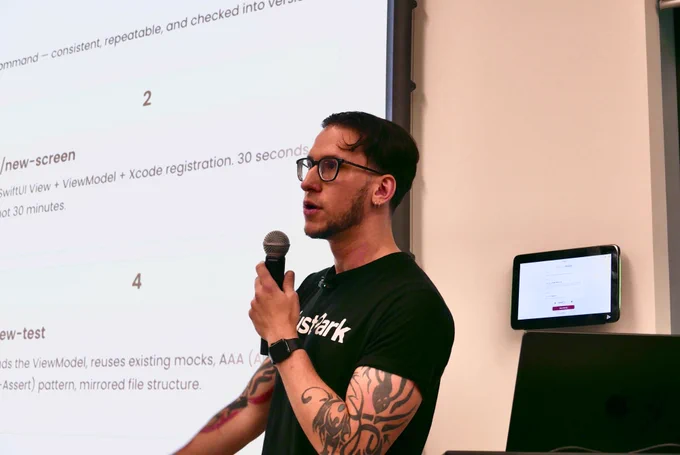 A photo of Raphael speaking.