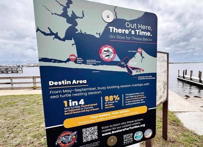Photo of an informational sign at a boat launch.