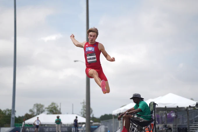 gavin barlow does long jump at the outdoor asun meet