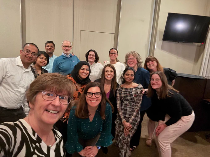 Selfie of TechSAge team and board members at dinner
