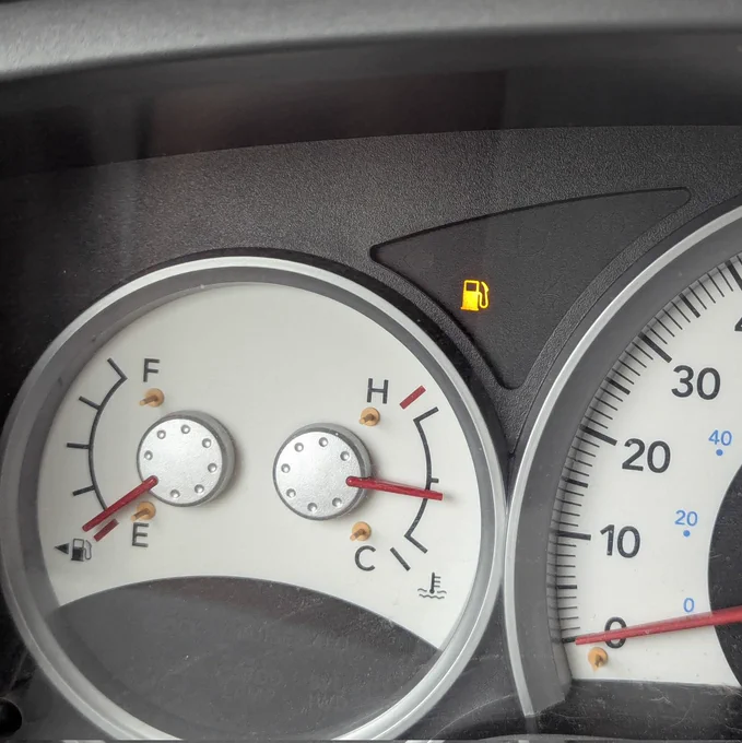 Fuel gauge near empty. Need fuel light is on. 
