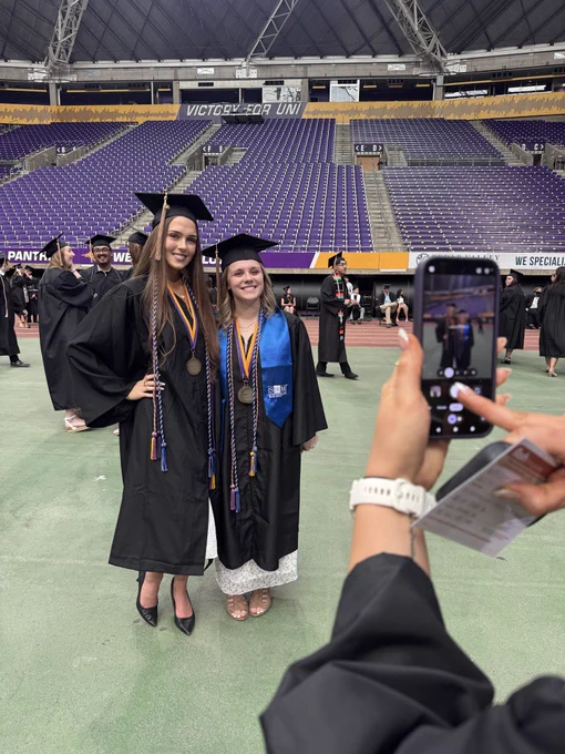 Grads posing for a photo